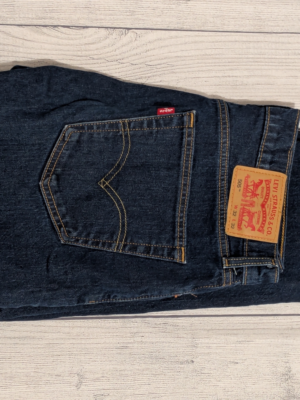 Levi's Straight Leg Men's Jeans in Dark Indigo with Tan Patch